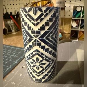 NEW. Gorgeous Blue and White Patterned Wax Candle. Brand new. Approx 6” tall
